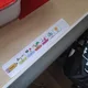 Rozvrh hodin s obrázky, štítky na sešity, procesní schéma na lavici 3